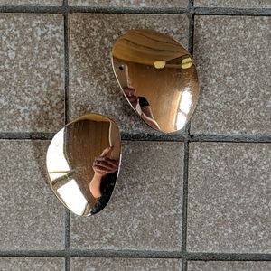 Gold oval ish earrings